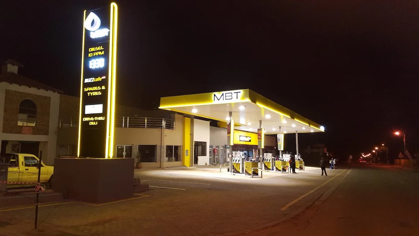 MBT Poppys Ventersdorp illuminated LED pylon sign at night